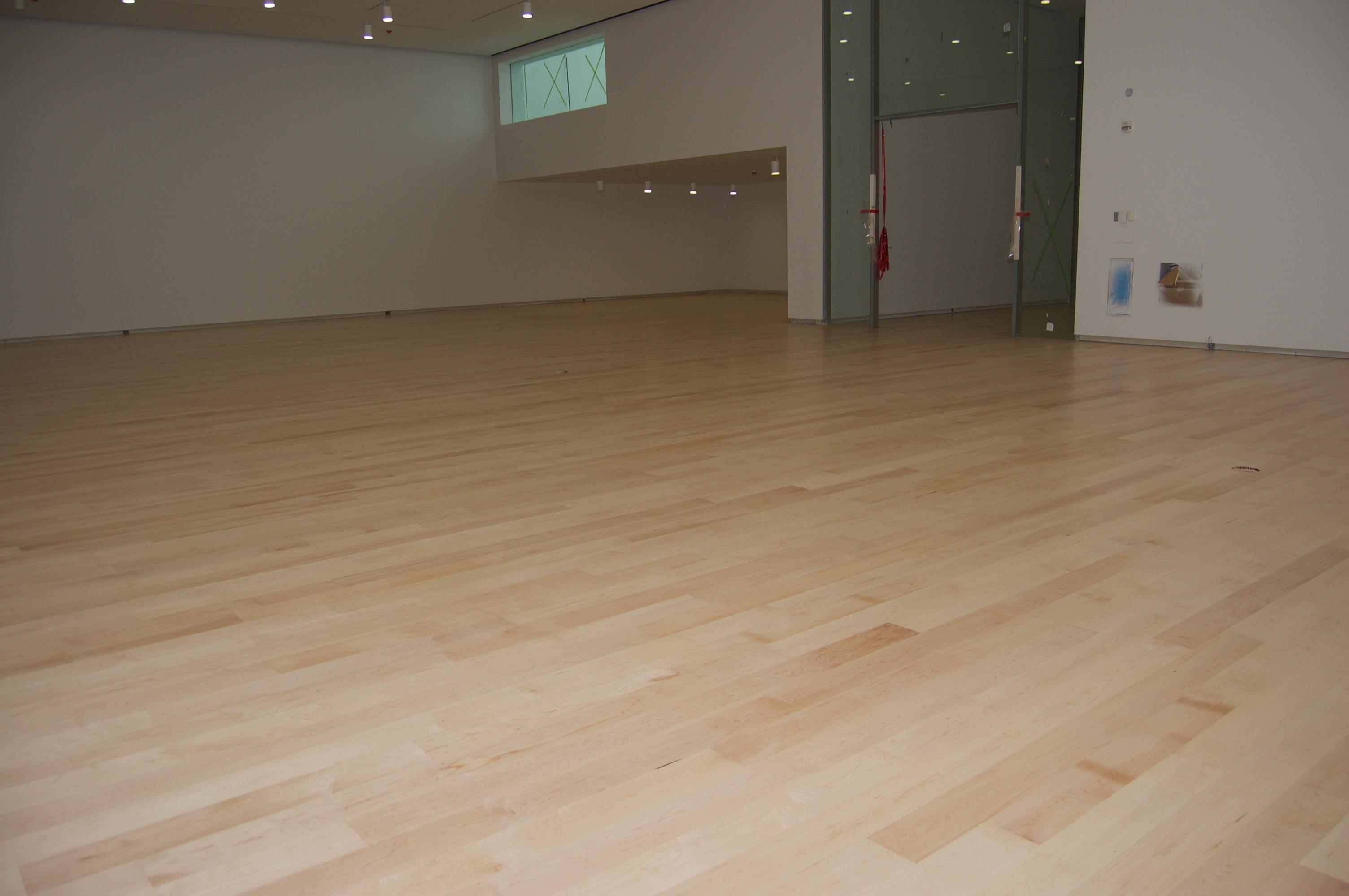 Une photo d'une réalisation de sablage de planchers d\où la réalisation est intitulé Musée national des beaux-arts du Québec